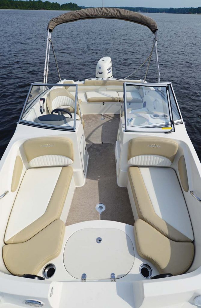 The spacious bow seating features under seat storage and stainless grab rails.