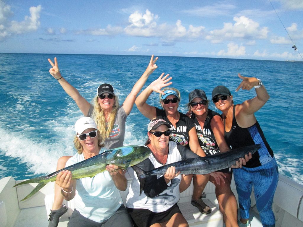 Gals With Mahi And Wahoo Treasure Cayweb